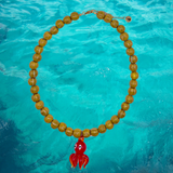 Collar pulpo rojo y piedras amarillas
