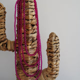 Collar cascada fucsia