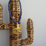 Collar pulpo dorado cuentas azules