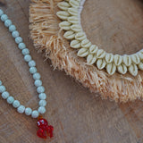 Collar pulpo rojo y piedras verdes